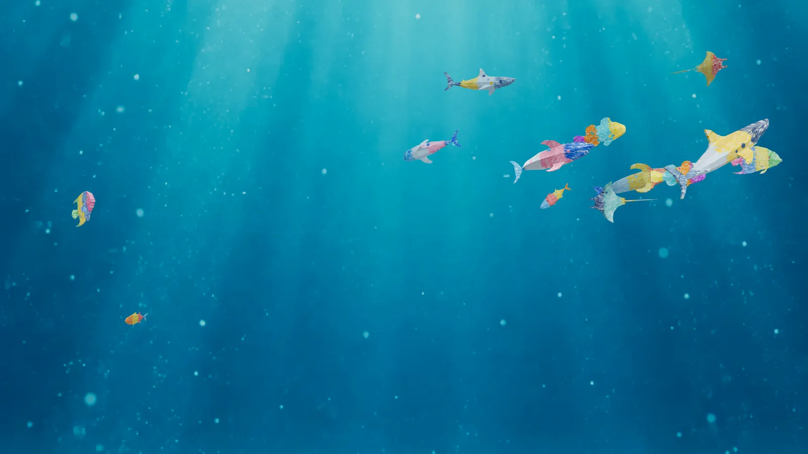 The aquarium: a shoal of crayon-coloured fish swimming through sunlit water